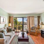 Easy Access - The living room provides quick and easy access to the lanai where you can sit and enjoy your surroundings.