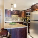 Spacious Breakfast Bar - Convenient and breezy, the kitchen accommodates several cooks. Use the long counter as extra eating space or as a buffet table for those big meals!