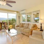 Welcome to Nani Kai Hale 303 - Settle into the comfortable living room furniture, make plans for the day, and enjoy spending time with friends and family.