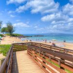 Beach Fun - Kamaole Beach 2, nearby, features accessible ramps, life guards, as well as shower and bathroom facilities.