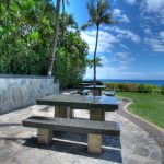 Delightful oceanfront BBQ Grill area includes picnic tables as well.