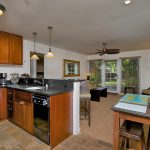 Kitchen offers stainless steel appliances and granite countertops