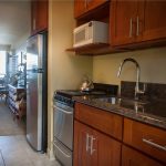 Newly remodeled kitchen features granite countertops