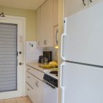 Galley style kitchen with a new stove - fully appliance'd