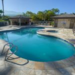 Every Vacation Needs a Pool - Two gated pool areas each feature a pool, hot tub, restroom and shower facilities, barbecue grills, and covered dining area.
