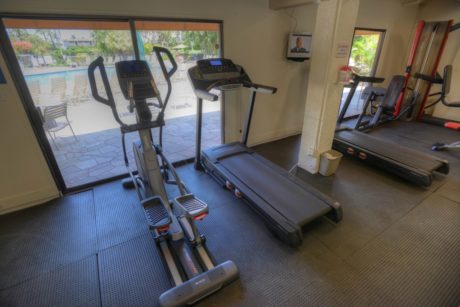 Don’t Leave Your Fitness Routine Behind - The clubhouse has a large fitness center that includes dumb bells, cardio equipment, resistance machines, and more.