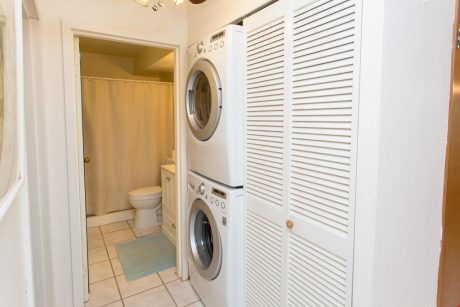 Fresh and Clean! - A stacked washer/dryer allows you to do laundry in the home, so you don't have to seek out a laundromat late at night.