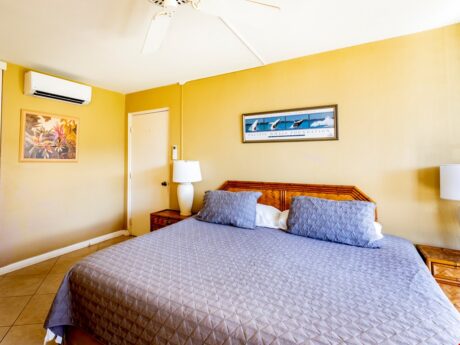 Haven of Relaxation - The primary bedroom is a haven for you to unwind and relax after a long beach day. Keep cool under a circulating ceiling fan as you drift off to sleep reflecting on your day.