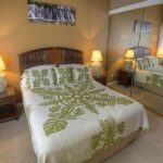 Primary Retreat - The comfortable king-size bed in the primary bedroom is so inviting. You’ll sleep like a baby after a day of fun!