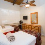 Fall Asleep Listening to the TV - The TV in the guest bedroom will help you unwind as you fall asleep on our comfy bed after another satisfying day at the beaches.