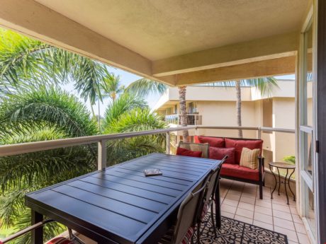 Relaxation on the Balcony - After a long day of fun, relax on the comfortable couch or gather around the table with friends and family to plan your next day's adventures.