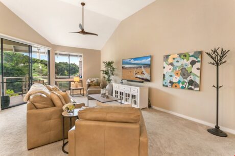 Living Room with Gorgeous Views - From the large, elegant windows to the attractive furniture, you and your guests will love spending time together in this bright and airy living area.