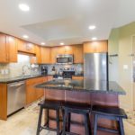Kitchen Island - The spacious kitchen island works perfectly as a breakfast bar or extra counter space when preparing a family meal or divvying up takeout!