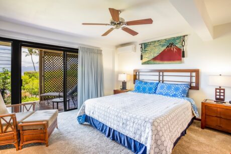 Haven of Relaxation - The primary bedroom is a haven for you to unwind and relax after a busy day. Keep cool under a circulating ceiling fan as you drift off to sleep reflecting on your day.