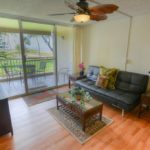 Easy Access - The living room provides quick and easy access to Menehune Shores 225’s balcony where you can sit and enjoy the cool breeze and share stories with a friend.