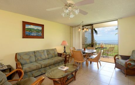 Family Room with a View - Enjoy sitting on the couch and playing a game of cards or watching the waves crash on the beach.