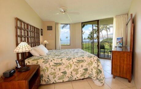 Primary Retreat - This is where relaxation happens! Before bed, spend some time on the balcony enjoying the ocean breeze. Then curl up in the king-size bed, watch some TV, then drift off to sleep.