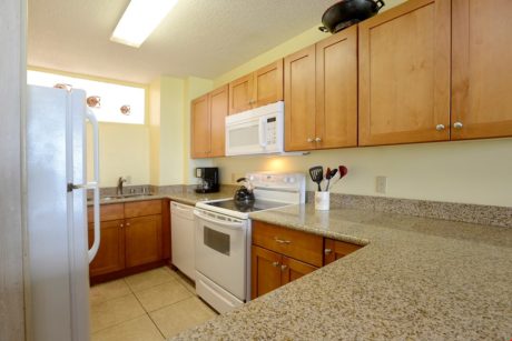 What’s Cooking? Anything You Want! - The kitchen at Kauhale Makai 434 is equipped with everything from an oven and microwave to coffeemaker, cookware, and tableware. There’s also a dishwasher, because scrubbing dishes isn't part of anyone’s dream vacation.
