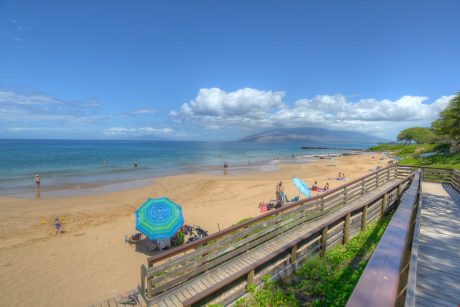 Relax and Unwind - Set up your umbrella and lounge in the soft golden sand of Kamaole Beach 3, one of Mauis best beaches.