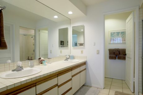 Dual Vanities Make the Difference - This spacious bathroom has plenty of space for two to get ready for a day on the beach!