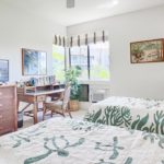 Cheerful Second Bedroom! - This bright and cheerful second bedroom is sure to delight your guests. After a good night's sleep on a comfortable twin-size beds, you can be sure they'll be ready to hit the waves!