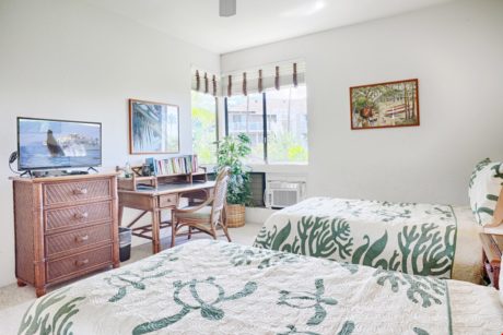 Cheerful Second Bedroom! - This bright and cheerful second bedroom is sure to delight your guests. After a good night's sleep on a comfortable twin-size beds, you can be sure they'll be ready to hit the waves!