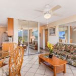 Welcome to Nani Kai Hale 501 - Settle into the comfortable living room furniture, make plans for the day, and enjoy spending time with friends and family.