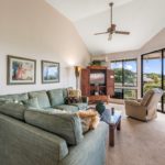 Welcome to Grand Champions 122 - Glass doors connect the living room of this one bedroom condo to the balcony, where you can wine and dine while looking out over the resort’s lush landscaping and admiring the Haleakala Mountains.