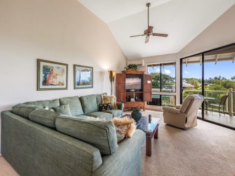 Welcome to Grand Champions 122 - Glass doors connect the living room of this one bedroom condo to the balcony, where you can wine and dine while looking out over the resort’s lush landscaping and admiring the Haleakala Mountains.
