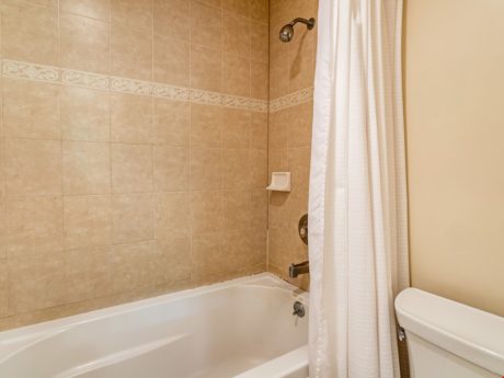 Guest Bathroom - Enjoy a shower or soak in the tub in this beautiful guest bathroom.