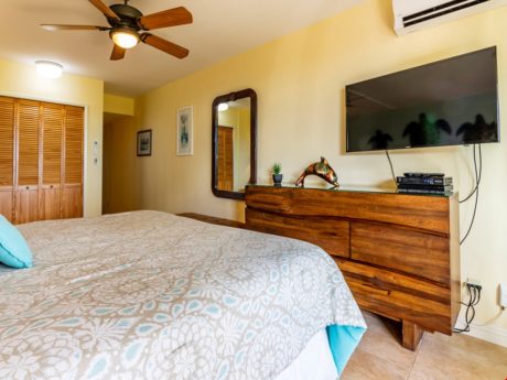 Fall asleep listening to the TV - The TV in the guest bedroom will help you unwind as you fall asleep on our comfy bed after another satisfying day at the beach.