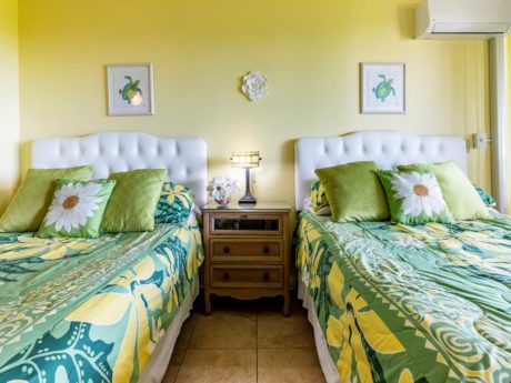 Colorful and Cheery! - Relax in these cozy beds in a colorful bedroom inspired by the the ocean and its inhabitants!