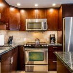 Gleaming Stainless-Steel Appliances - Beautiful stainless-steel microwave, stove and side-by-side refrigerator accent the newly remodeled Maui Banyan H-302 kitchen. It’s truly a pleasure to whip up snacks or full meals in this kitchen.