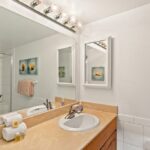 Primary En Suite - Get ready for a luau or restaurant dinner in your primary en suite with walk-in shower and large vanity.