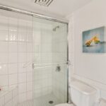 Sparkling Clean - The primary en suite shower is sparkling clean and you will be also after you emerge from the water.